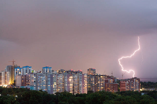 istock Thunderstorm in the city. lightning bolt 539360294