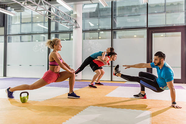 istock Group of young athletes warming up before sports training. 539362720