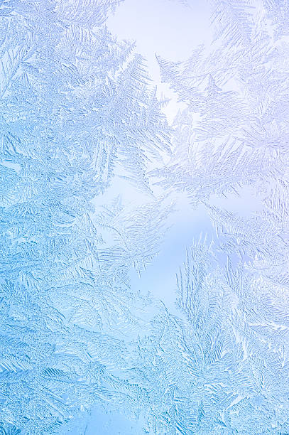istock Beautiful Winter Window Pane Coated By Icy Frost Shiny Patterns 539363652