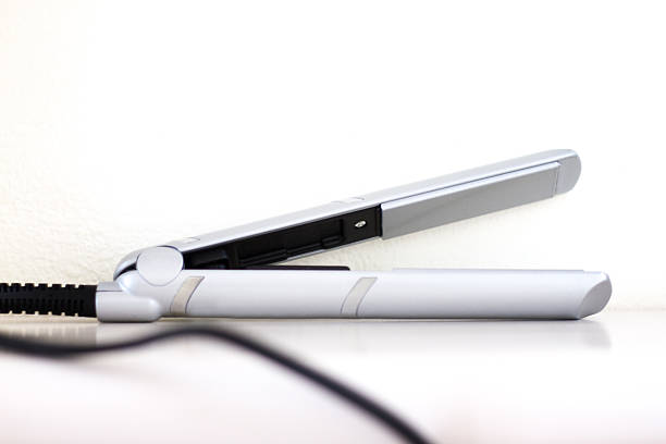 istock Straightener/Flat Iron with Cord on White Background 539364344