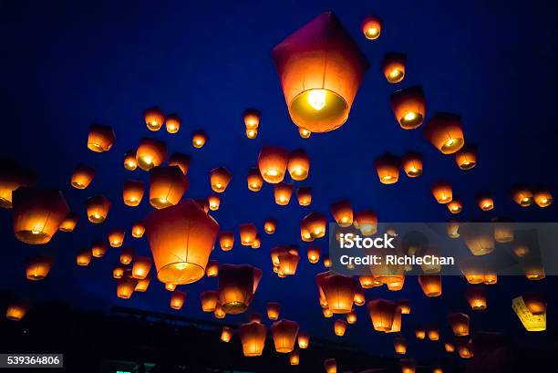 Sky Lanterns Against The Sky With Blue Tone Stock Photo - Download Image Now - Lantern, Taiwan, Chinese Lantern Festival