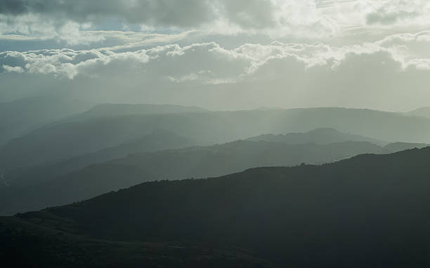 istock mountains silhouette with fog natural daily light 539367882