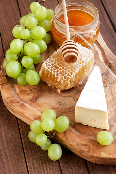 istock Still life with cheese, grape and honey 539368734