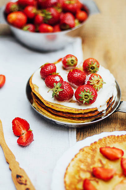istock Strawberries and whipped cream  for dessert. 539368848