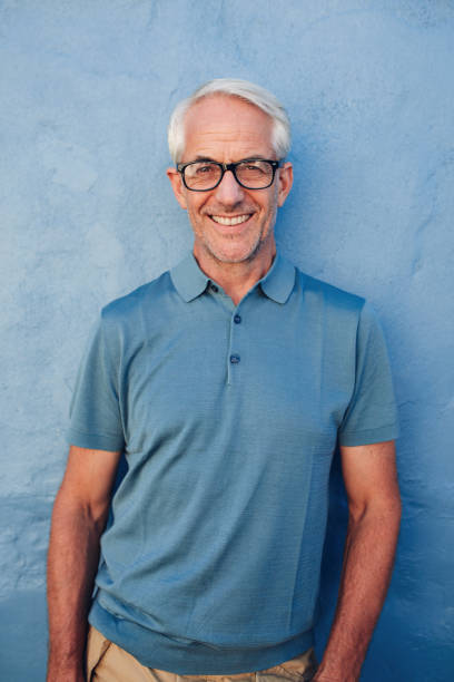 istock Handsome mature man smiling at camera 539369108