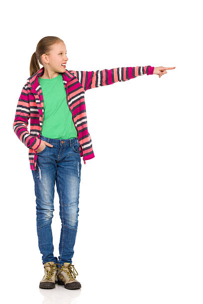 istock Smiling Child Girl Pointing 539369172