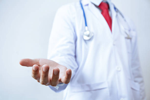istock Doctor with stethoscope offering helping hands gesture 539371198
