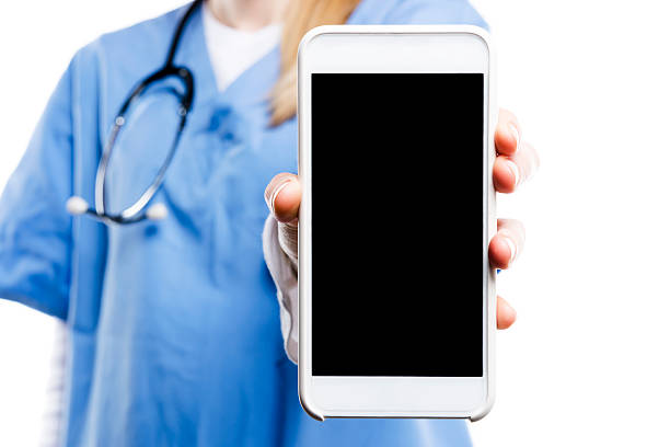 istock Doctor showing smart phone 539371794