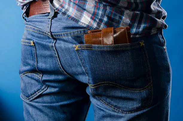 wallet in his pants pocket