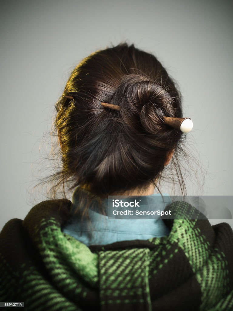 Young Woman With Hair Bun Stock Photo - Download Image Now - Rear View,  Studio Shot, Portrait - iStock