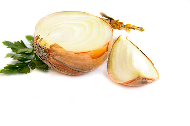 istock Fresh bulbs of onion on a white background 539437456