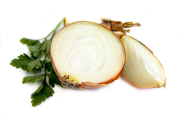 istock Fresh bulbs of onion on a white background 539437526
