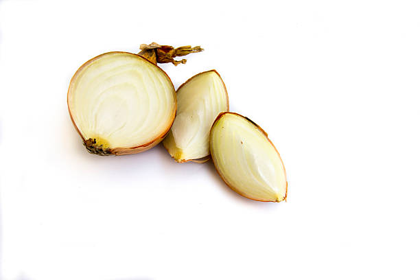 istock Fresh onion bulbs isolated on white background 539437590