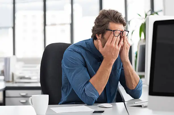 Photo of Stressed young businessman