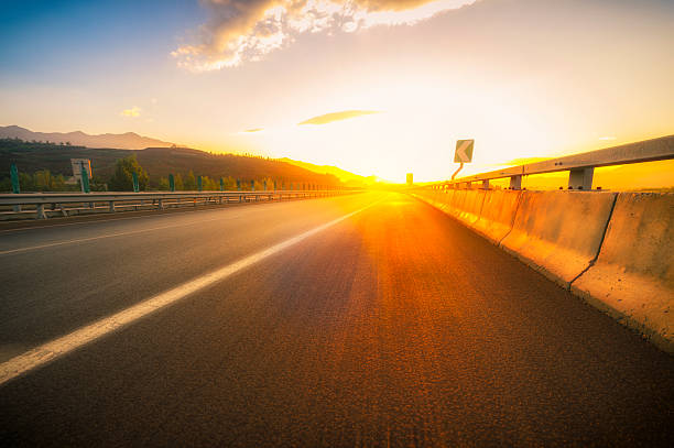 istock Asphalt road with Blurred Motion at sunset 539439146