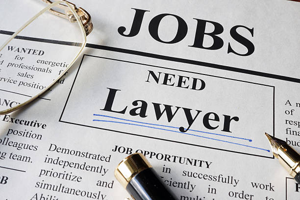 istock Newspaper with ads for vacancy Lawyer. 539439326