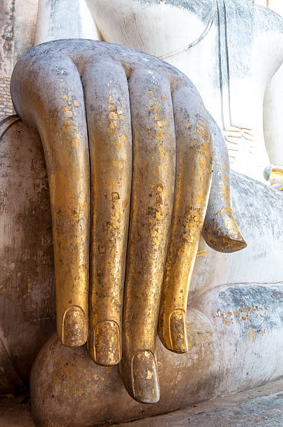 istock Close up ancient hand of buddha. 539440144