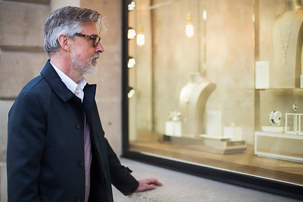 istock Elegant man doing luxury window shopping 539441720