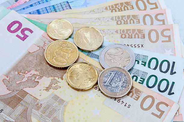 istock Money euro coins and banknotes 539441936