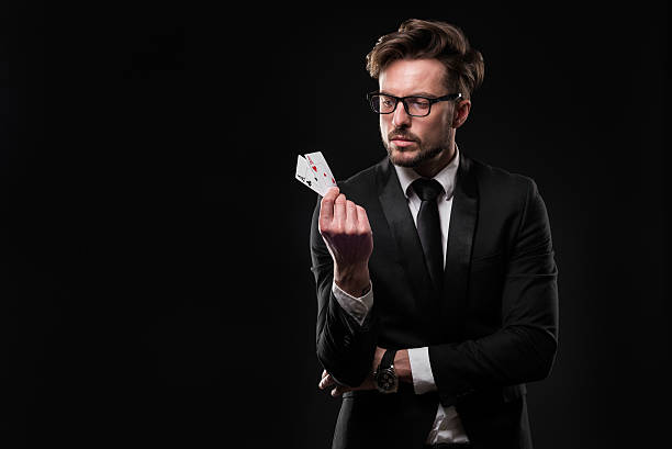 istock Man holding pair of aces 539444970