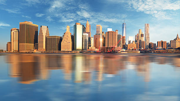 Manhattan at sunrise, New York Manhattan at sunrise, New York liberty tower stock pictures, royalty-free photos & images