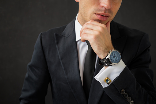 Business man with fancy wrist watch