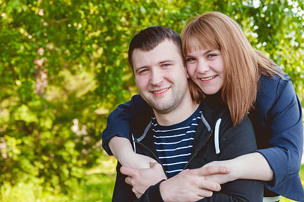istock Cheerful Romantic Couple in Love Huging Together 539450456