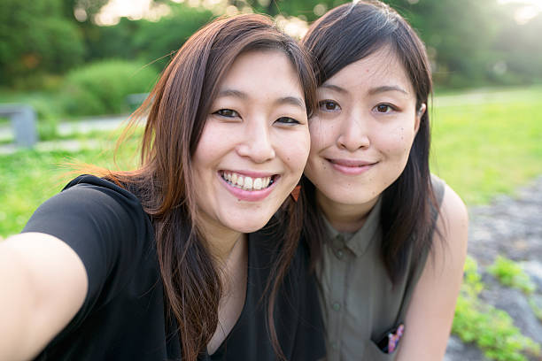 istock Lesbian couple taking a selfie together 539451300