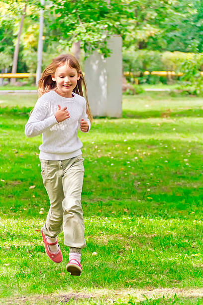 istock Cute running girl 539452066