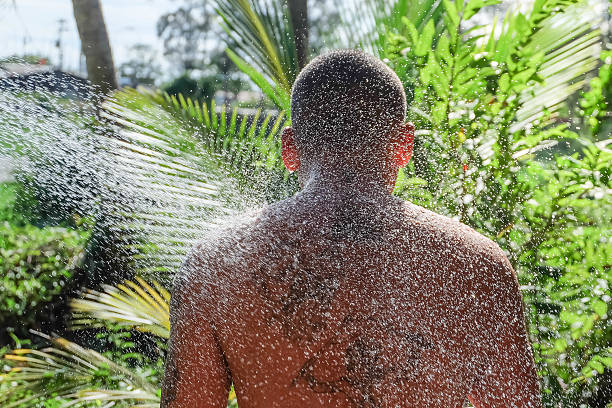 take a shower take a shower shower men falling water soap sud stock pictures, royalty-free photos & images