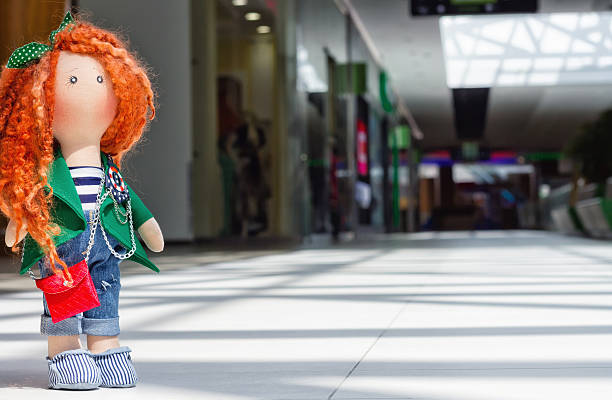 istock handmade doll with curly red hair 539457644