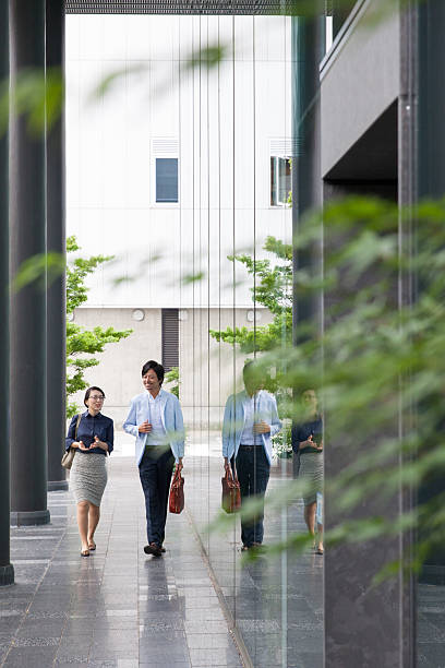 istock the business people talking at office lobby 539457672