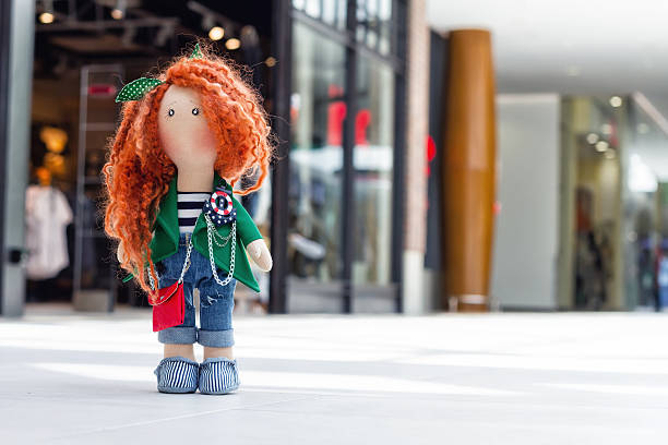 handmade doll with curly red hair
