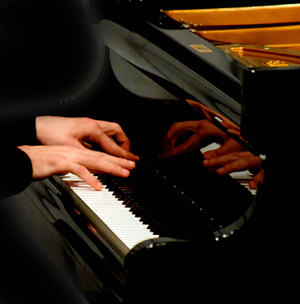 istock his hands moving on the piano keys 539457926