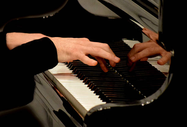 istock his hands moving on the piano keys 539458146