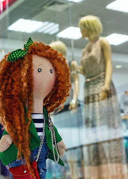istock handmade doll with curly red hair 539458428