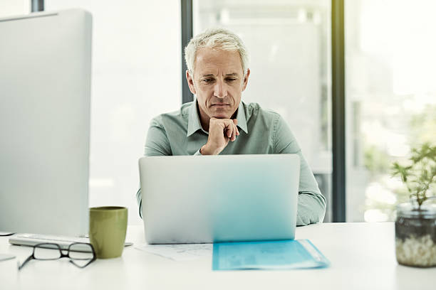 istock Giving his full attention to the project 539459052