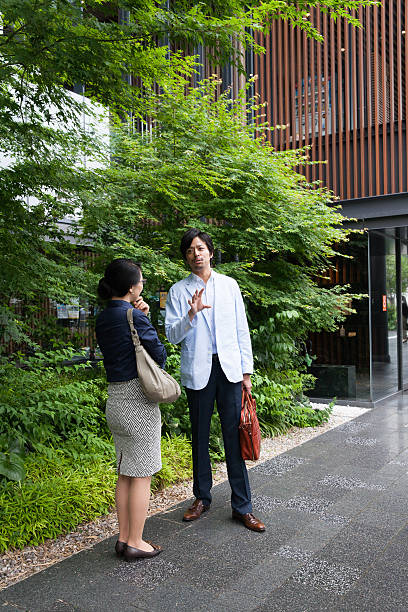 istock the business people talking at office lobby 539459850