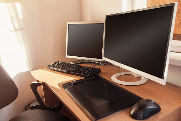 istock modern computer and tablet at artist office 539460538