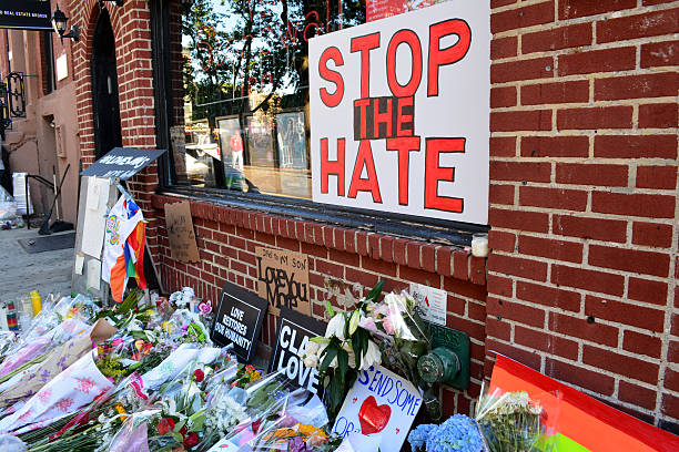 Stonewall Inn New York, USA - June 12, 2017: Memorial outside the landmark Stonewall Inn in honor of the victims of the mass shooting at a gay nightclub in Orlando in New York City in 2016. islamic state stock pictures, royalty-free photos & images
