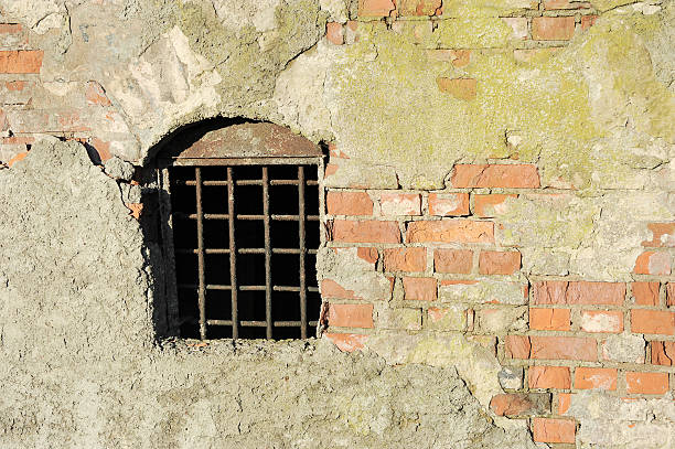 istock abstractly background of rusty grate in prison 539463312