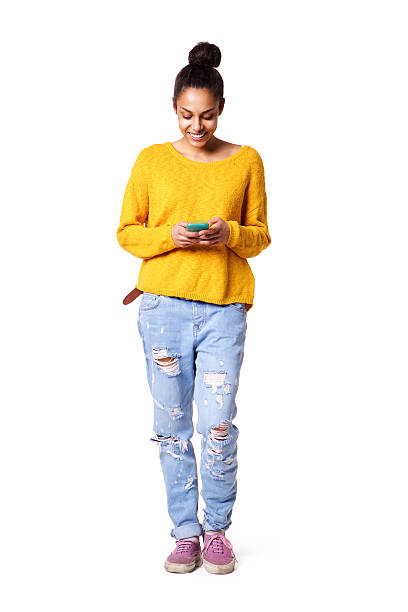 istock Happy young lady reading text message on her cellphone 539465034