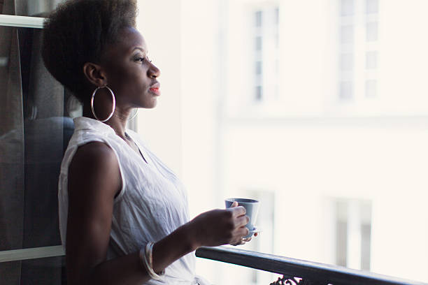 istock French Woman with Cap of Coffee 539467356