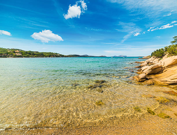 istock blue sky over Cala Girgolu 539468322