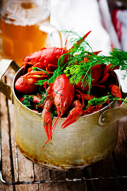 istock boiled crayfish with dill in a vintage metal pan 539469256