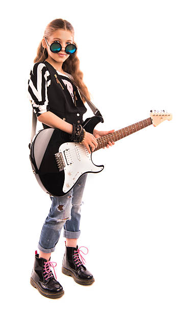 istock girl with a guitar on a white background 539469578