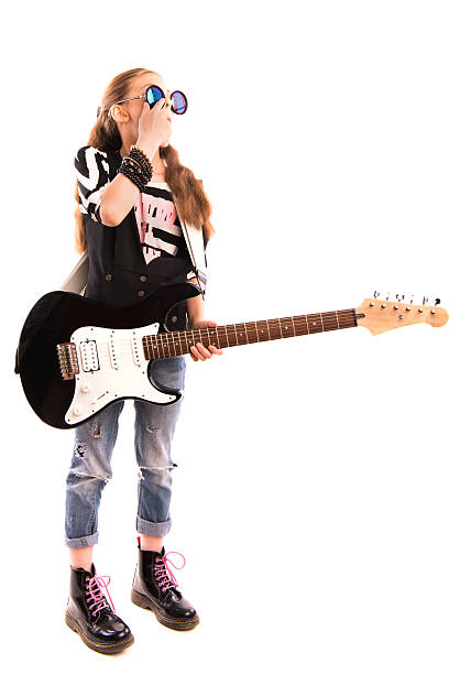 istock girl with a guitar on a white background 539469626