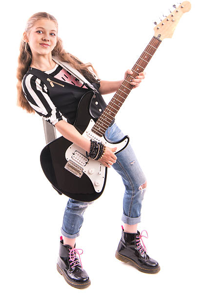 istock girl with a guitar on a white background 539469780