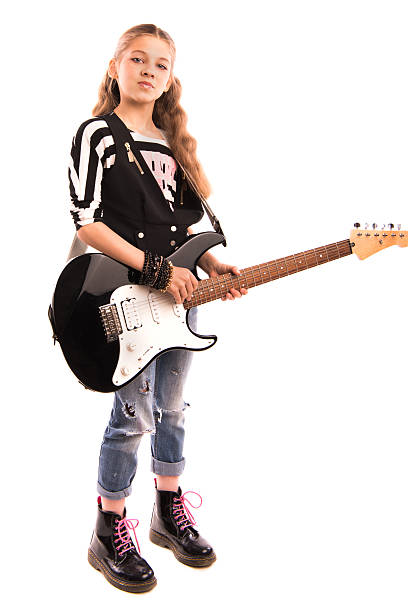 istock girl with a guitar on a white background 539469834