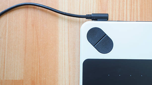 istock close up view of man working with tablet 539470788